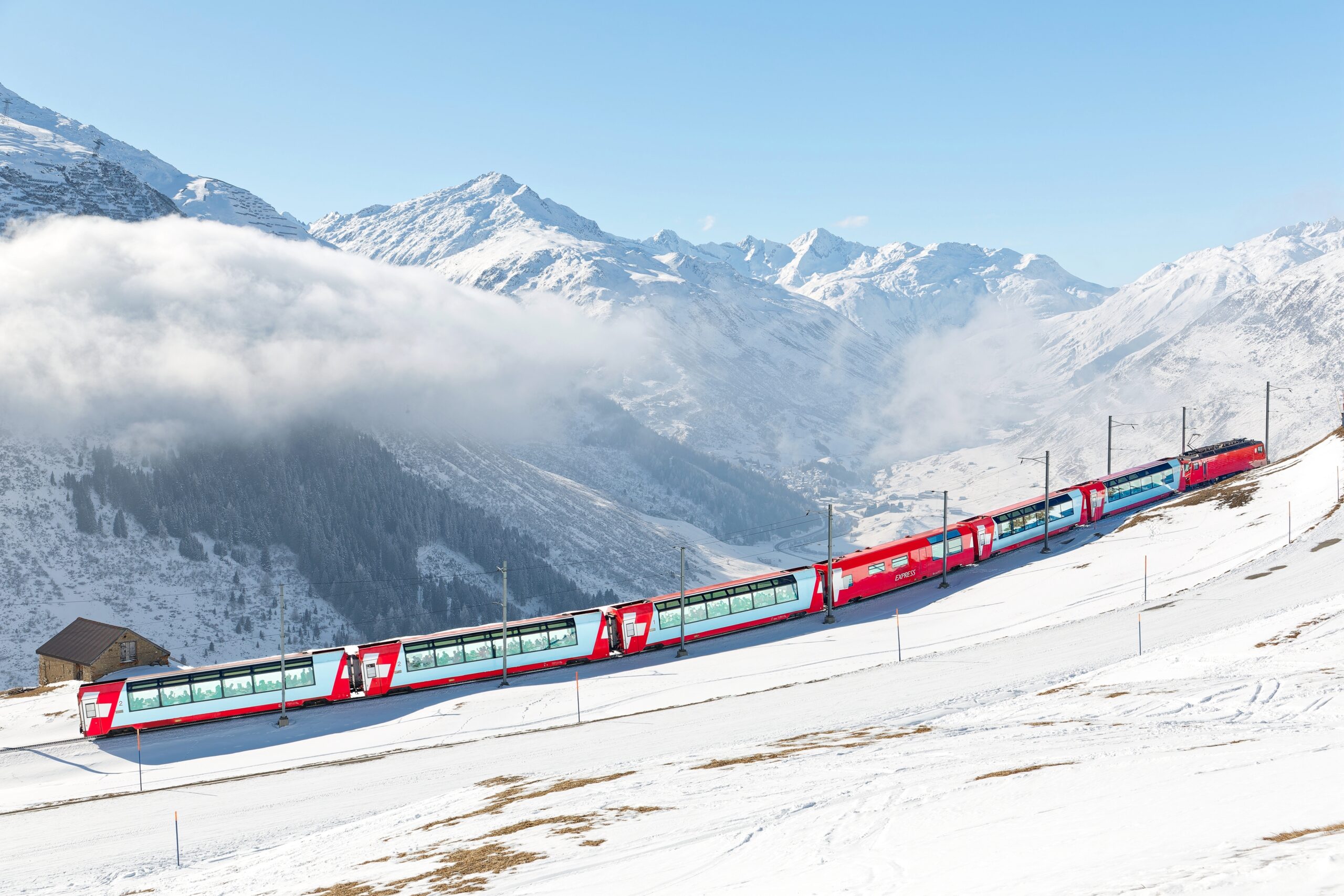 Tourists,Ride,On,A,Glacier,Express,From,St.,Moritz,To